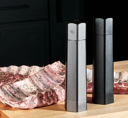 HexClad salt and pepper mills beside a barbecue rack